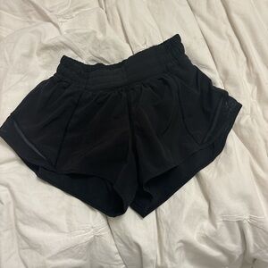 Lululemon Hotty Hot shorts in black- size 2 (low rise 2.5 inch)